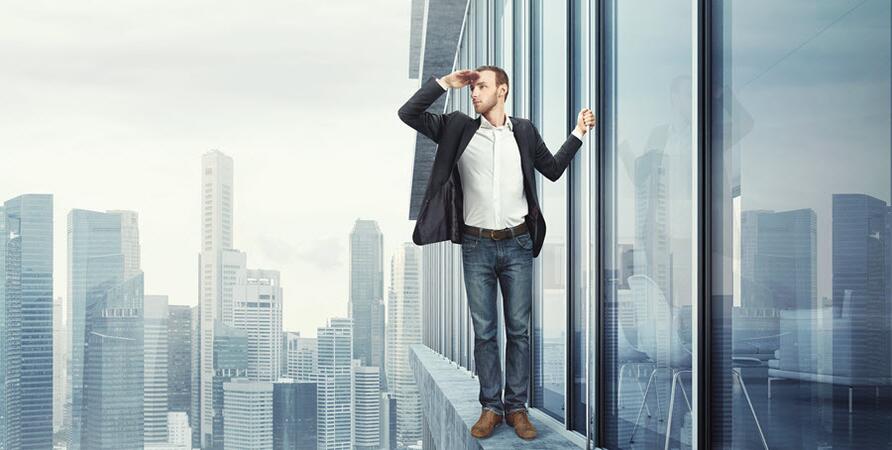 bigstock-man-standing-on-the-edge-and-l-51485959